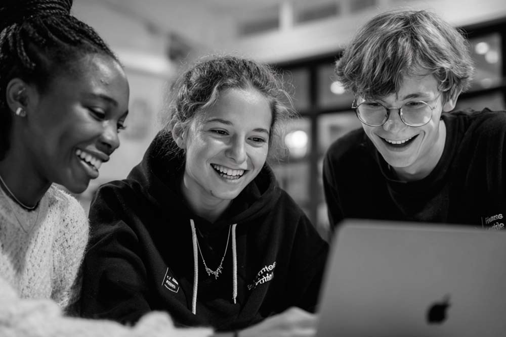 A person working on a computer in an office environment